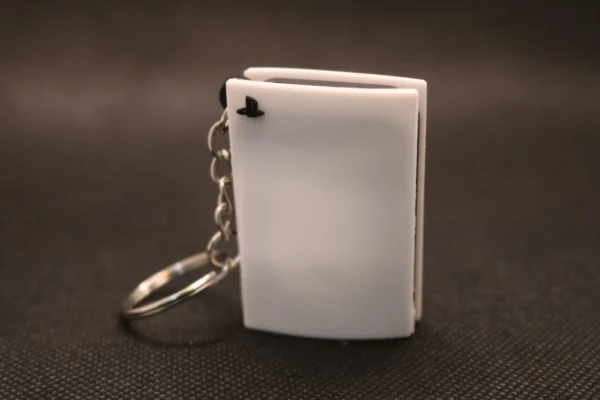 white ps5 keychain